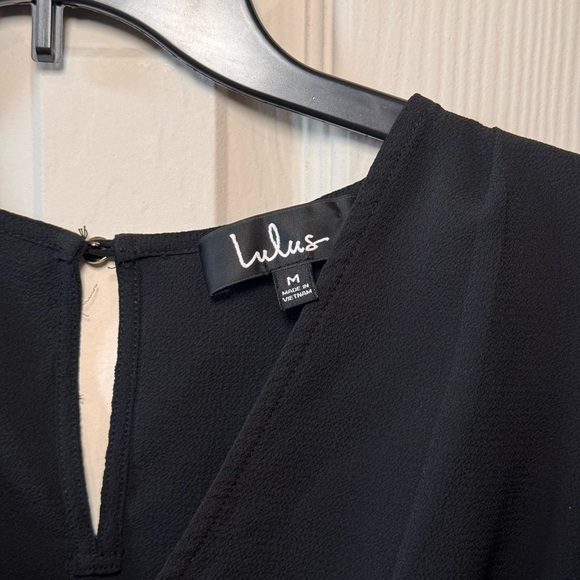 Lulu's Black Long-Sleeve Wrap Peplum Blouse - Picture 2 of 3